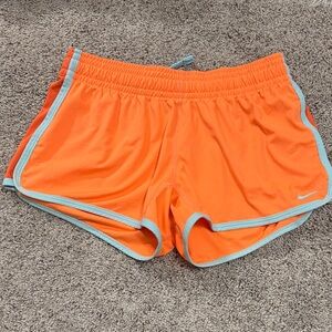 Nike Women's Bright Orange Running Shorts with Light Blue Trim